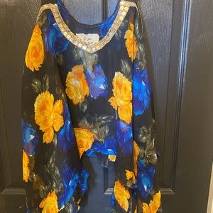 Free people hold and blue Flowy tank